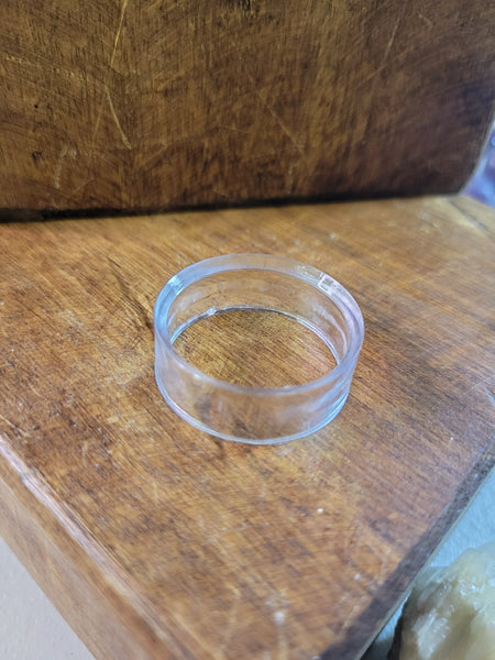 Clear plastic sphere holder